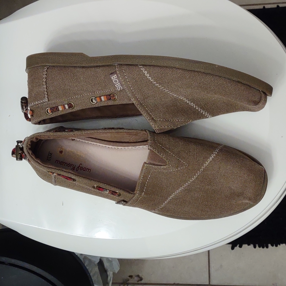 Sketchers Bob's brand size 10. They are brown and have only been worn twice. OBO